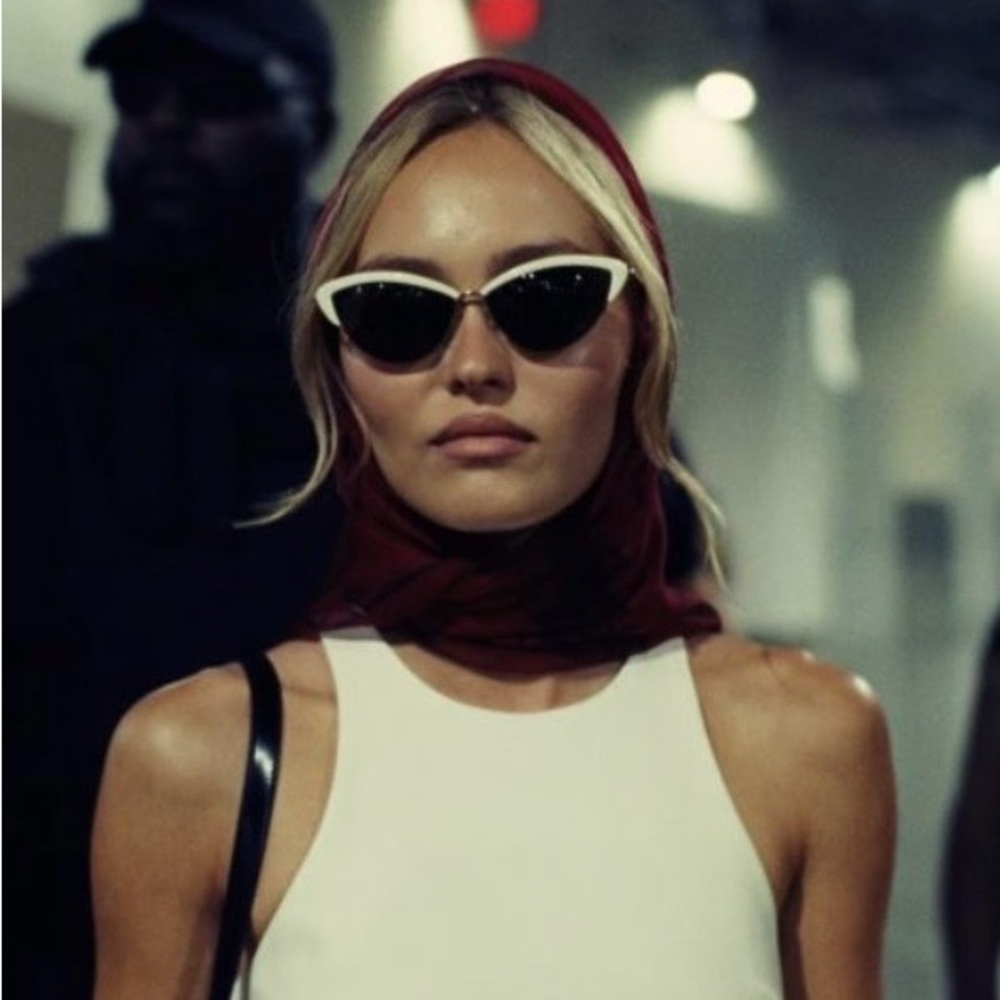 Miu Miu White Cat Eye Sunglasses with Black Lenses